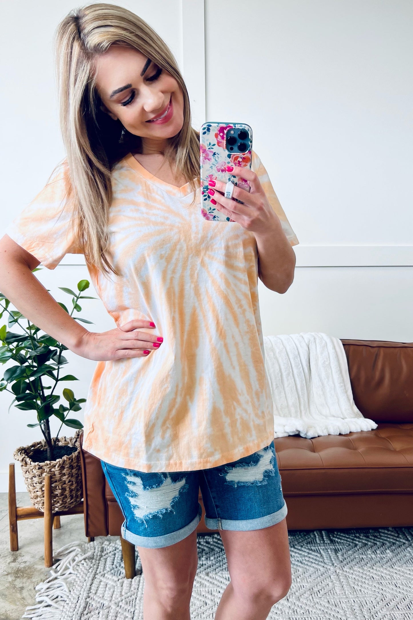 Spin Me Round Spiral V Neck Tee in Orange Cream