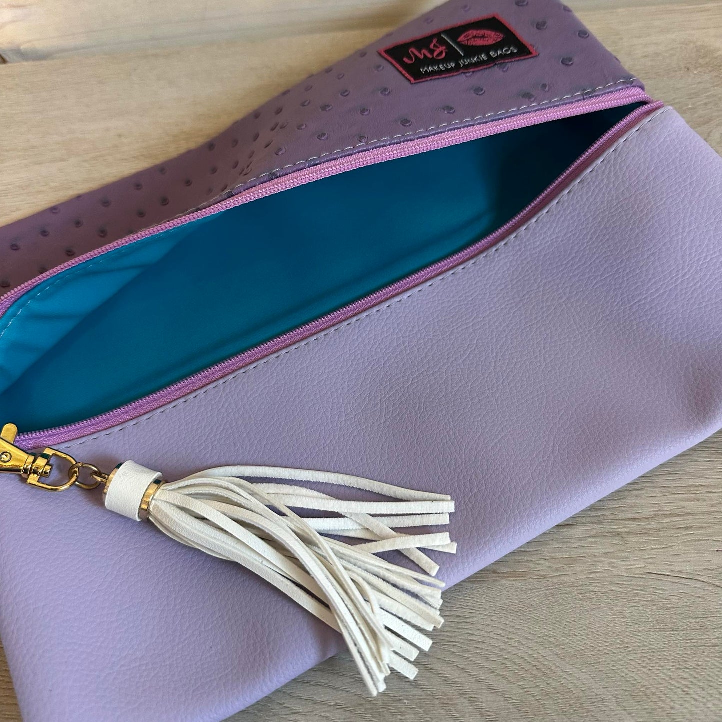 Two Faced Purple Ostrich Custom Junkie Bag
